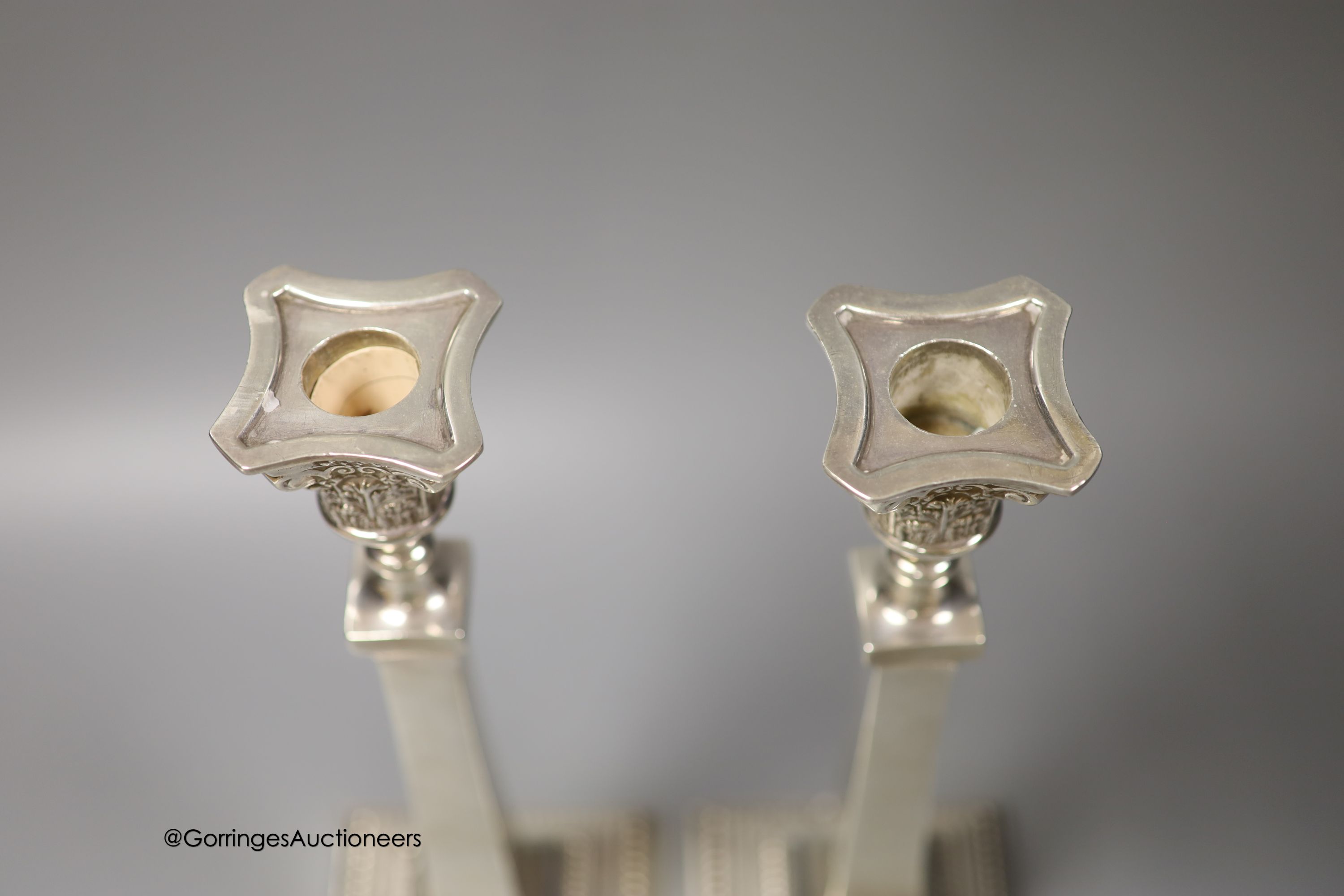 A pair of George V silver candlesticks, Britton, Gould & Co, Birmingham, 1934, 28.4cm, 20.5 oz, lacking sconces.